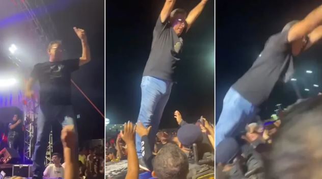 Prefeito se empolga em festa, pula na plateia, mas cai no chão